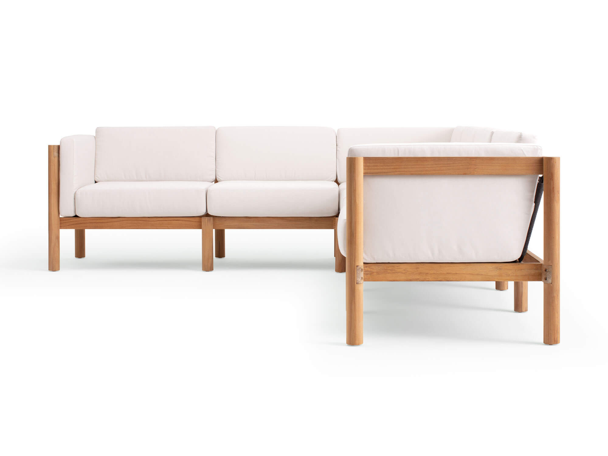 Side view of 6-piece outdoor sectional with white arm cushions